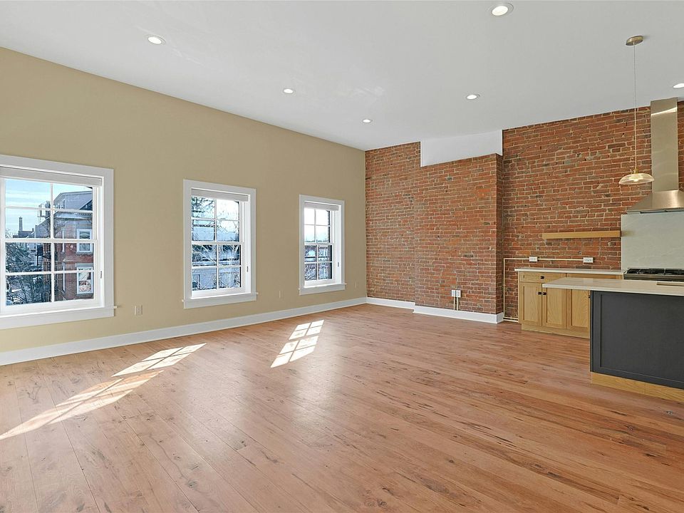 Sun-filled living, dining and kitchen areas.