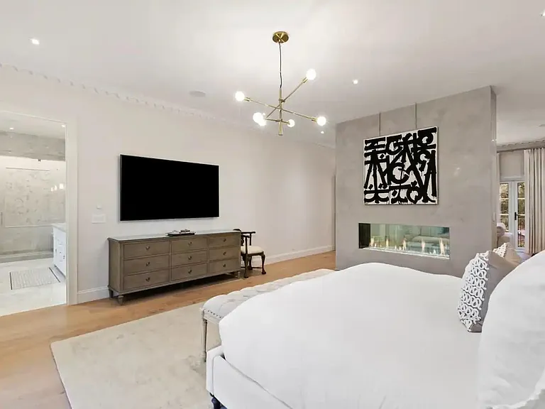 Master bedroom with state of the art television.