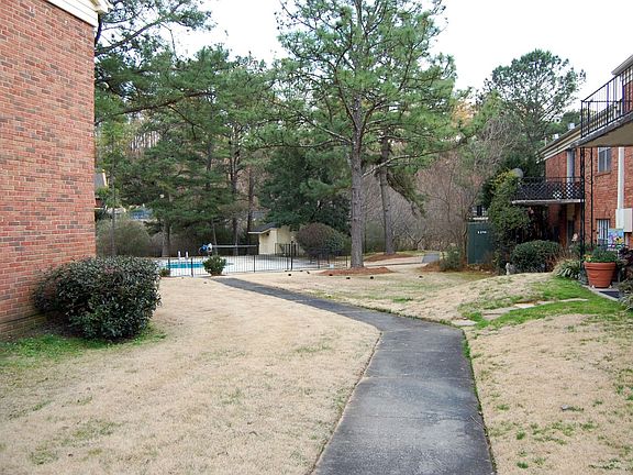 Path directly across from builing to the pool