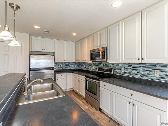 5th image of 18731 E 58th Avenue #A