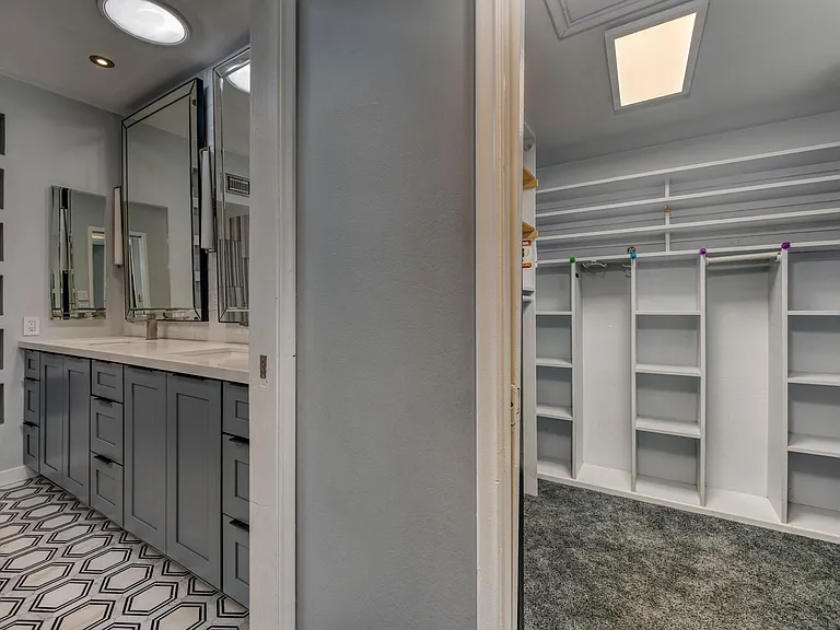 Bathroom with 2 walk in closets
