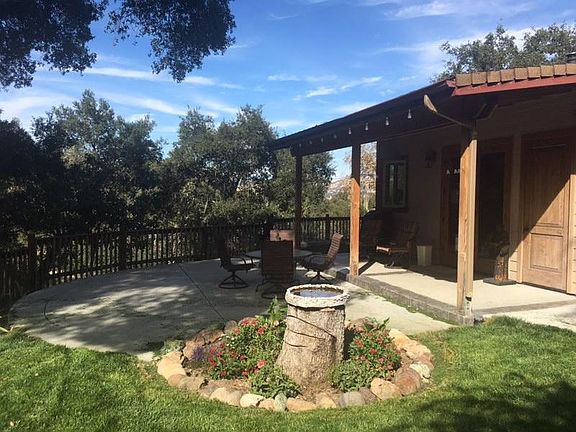 A view of the backyard looking towards the back of the cottage.