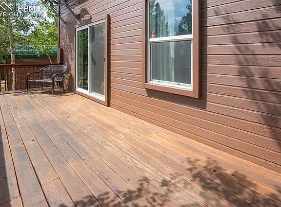 Enjoy Pikes Peak views, star gazing and the wildlife from this large walk-out deck