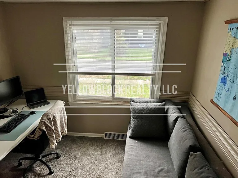 320 E 79th Ter — Photo 18