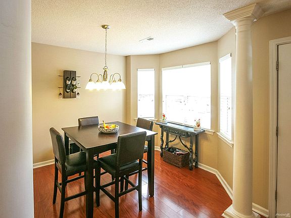 Architectural columns and bay window area in dining room