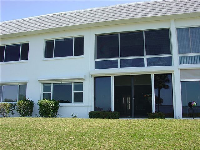 Back Of Condo Add Patio Stones & Enjoy The Outdoors!