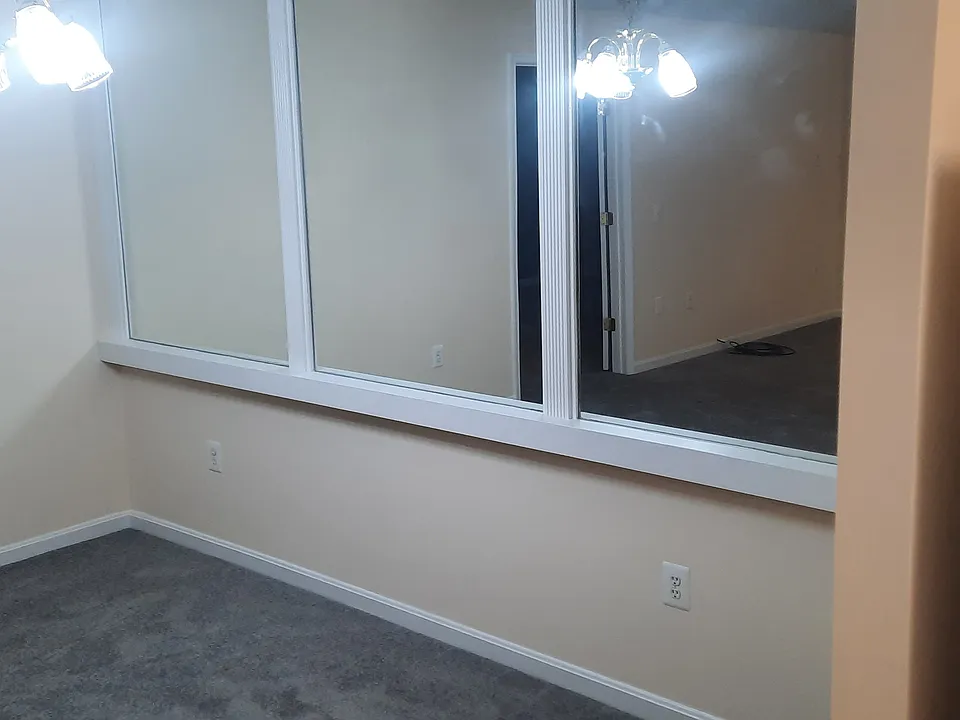 Dining area, full wall mirror.