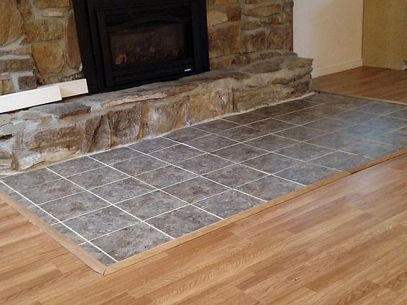 Open living area with gas fireplace