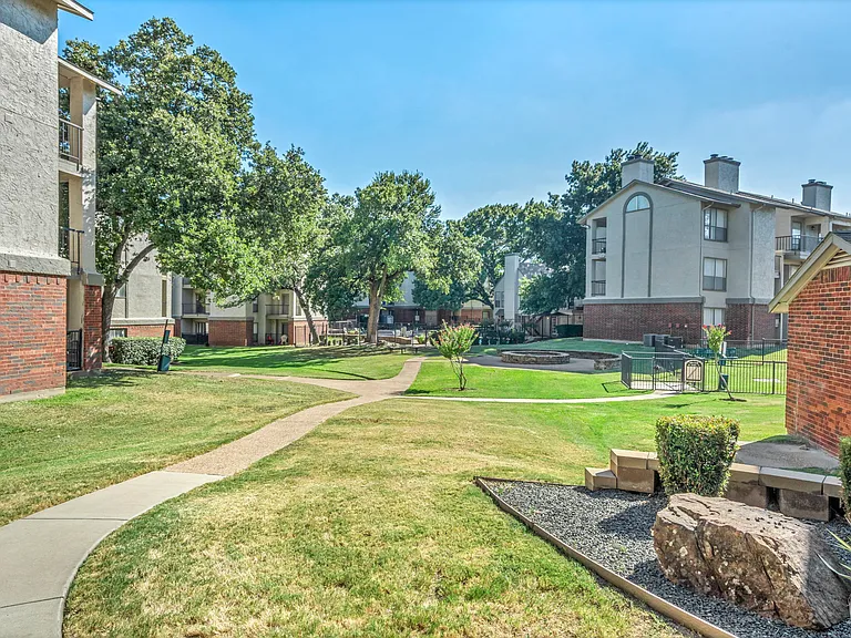Green community spaces with pet-friendly walking areas.