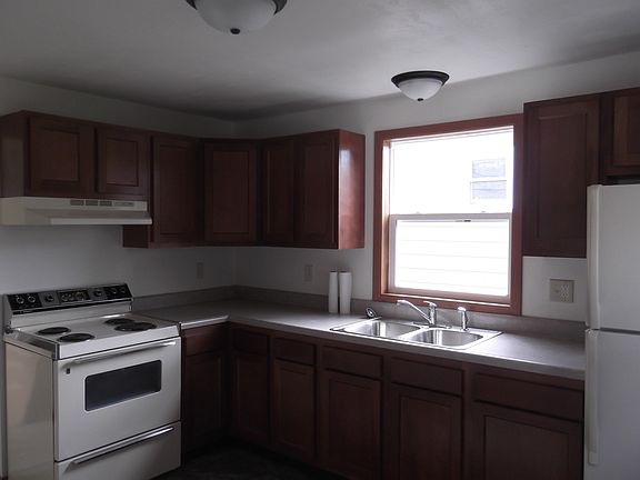 Newly remodeled kitchen, new cabinets, flooring, windows.