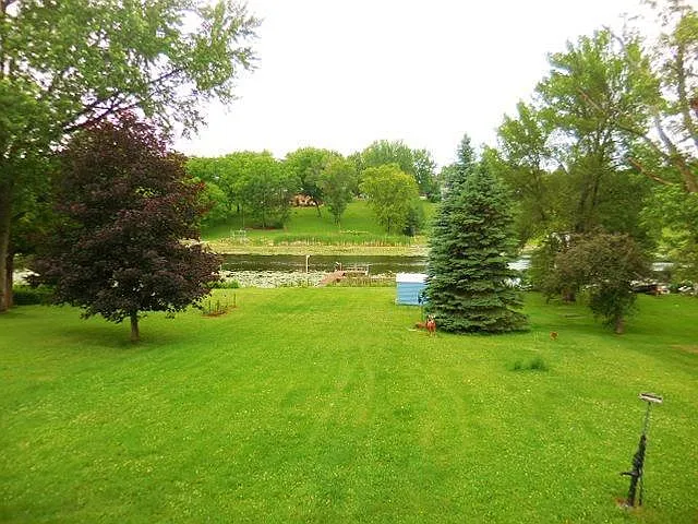 Perfectly landscaped back yard for all of your spring and summer activities.
