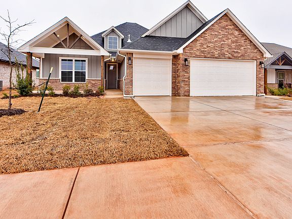 Front of Home with 3 car garage
