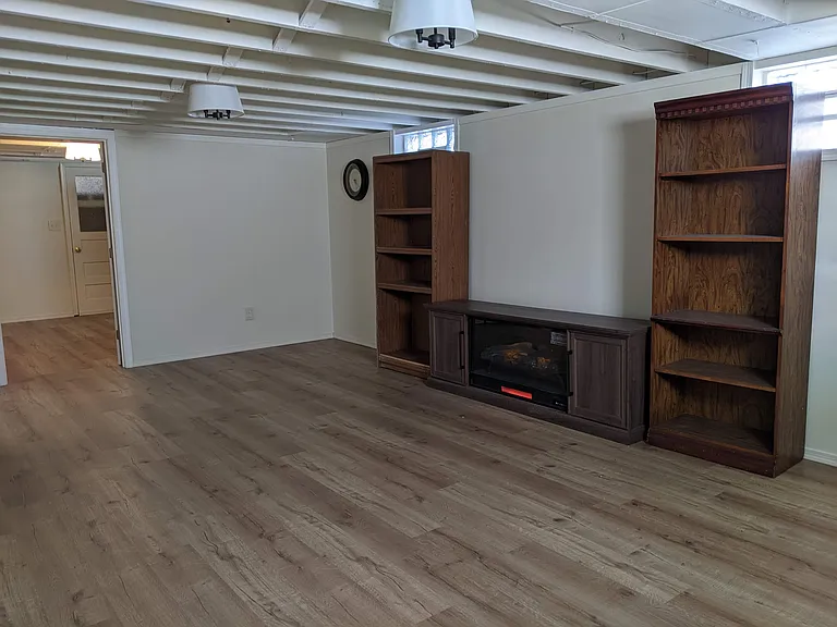 Additional 800 sq. ft. of bonus space consisting of 2 rooms. This is in addition to the amount of 1586 sq. ft. This being the larger family room area.