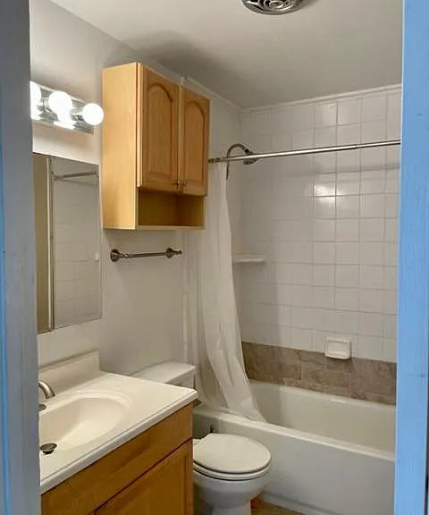 Refurbished bathroom with tub and shower
