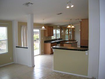 http://www.propertyboss.net/CustomerImages/AMMRE_1205/media/Properties/140%20Camino%20de%20las%20Huertas%20(PO)\/zsmall_KIT-FAM-1.jpg