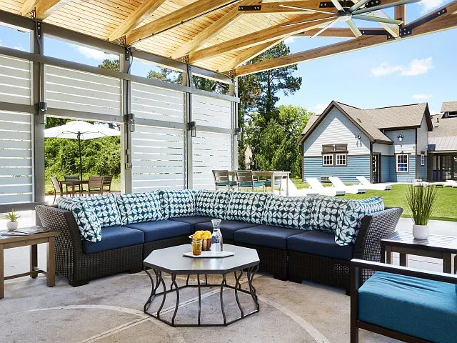 Experience Comfort and Style in our Outdoor Lounge with Vaulted Ceiling and Ceiling Fan at The Flatts Salisbury