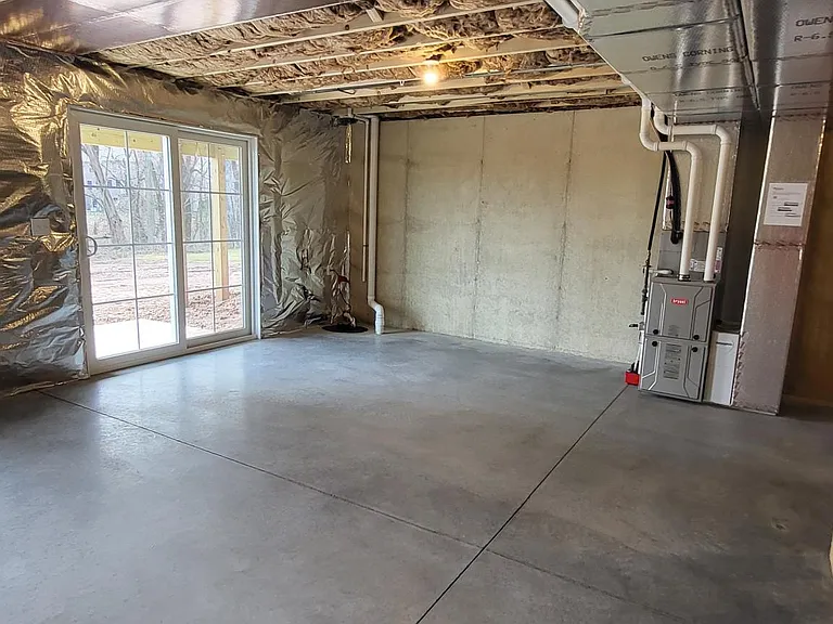 Unfinished Walk-out Basement with a sliding door