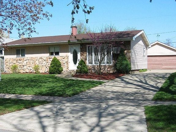 Front Right, side Driveway, and 2.5 
Car Garage