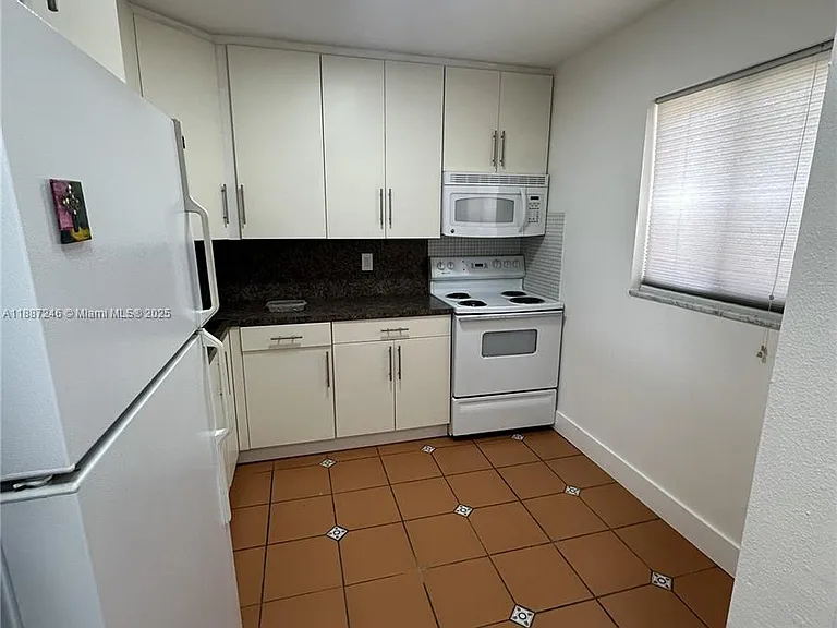 7703 Camino Real #A-413 — Photo 3