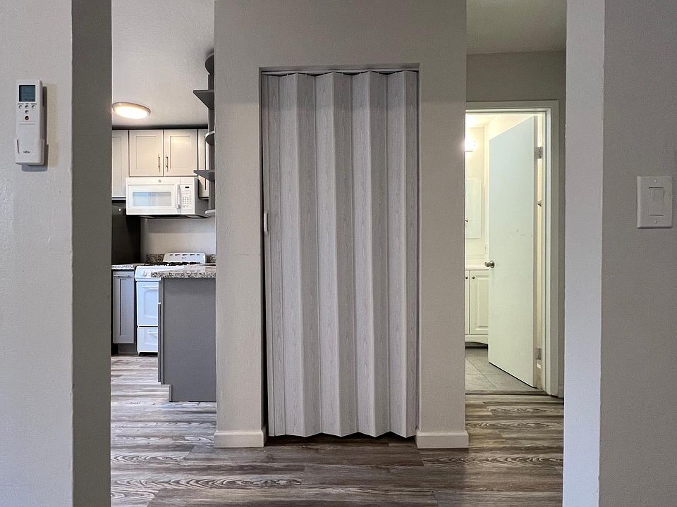 Hallway to kitchen and bath. Taken from Living room