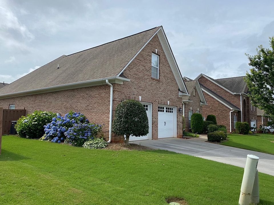 Front Yard with manicured lawn.