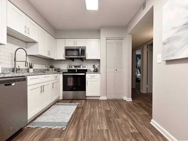 Wood Style Flooring and New Cabinetry, Granite Counters, Stainless Appliances