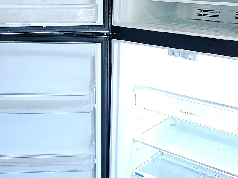 this is the fridge that is there now , its BLACK, not stainless steel