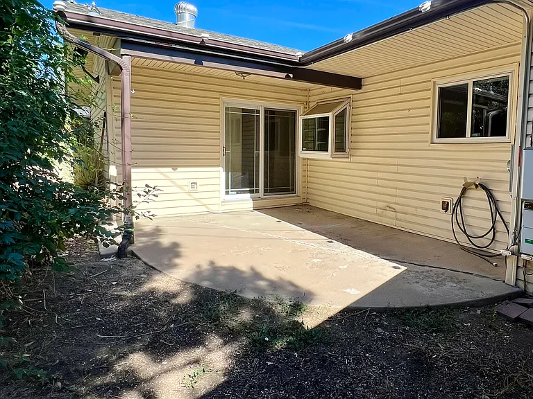 Patio and small backyard