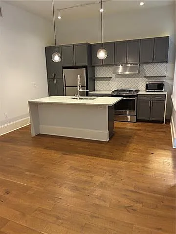 Building Photo - 221 Chartres St #203