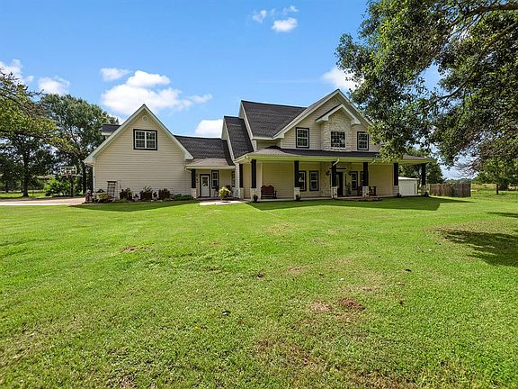 Secondary front entry leads to the 4th bedroom