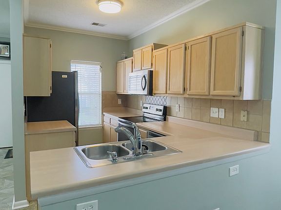 5th image of 1777 Grand Bay Dr #1