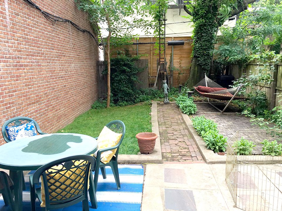 Massive private back yard. Includes all furniture shown. Gri