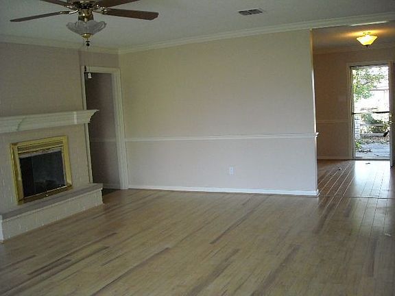 Lovely Fireplace anchors den