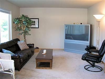 Living area is large.....room for plenty of furniture AND a big-screen TV!