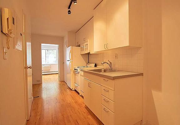 5th image of 319 E 8th St APT 1B