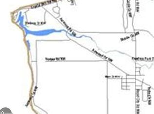 6218 Harper Rd, Rapid City, MI 49676