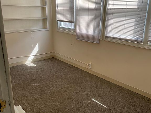 Sunporch, back of house, for office etc.