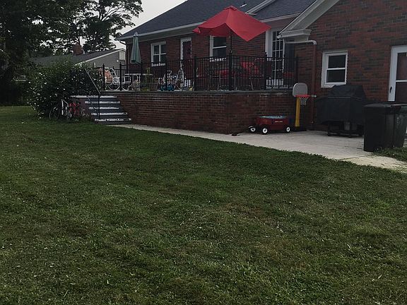 back of house notice large balcony from sliding door deck
