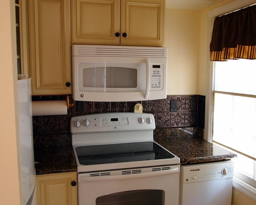 Dishwasher and full-sized stove and microwave