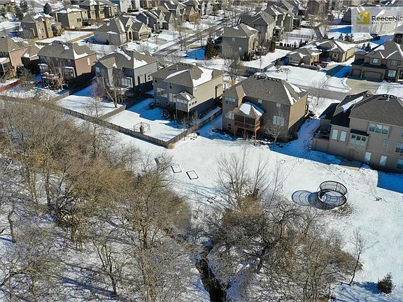 This private back is lush most of the year, filled in with mature trees. Don't miss the garden beds ready for your herbs and veggies!