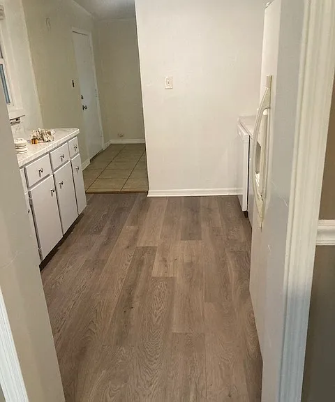 new waterproof luxury vinyl plank flooring in kitchen