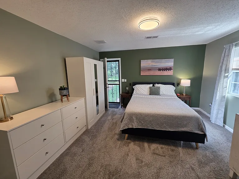 Bedroom #1 -Primary (has access to backyard/separate entrance; has full private bathroom attached); attack access via this room