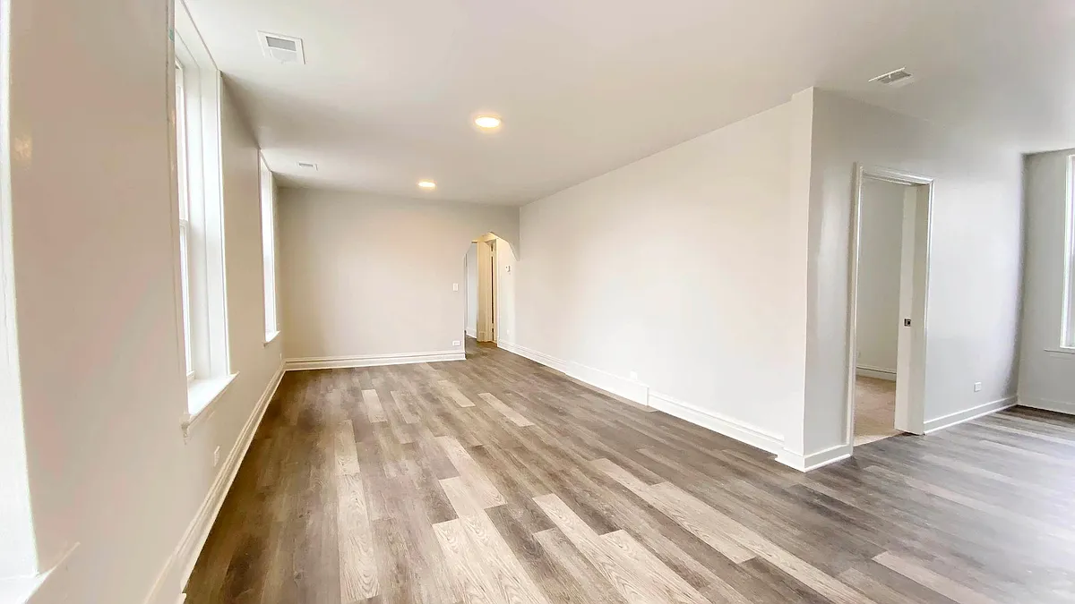 Photo 2 of 21 - 3638 W Belmont Ave #2R - Chicago, IL Huge Sunny Living Space from the rear exit - 3638 W Belmont Ave #2R