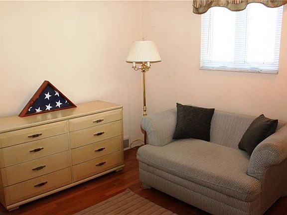 Bedroom # 2 complete with beautiful hardwood floors and plenty of light