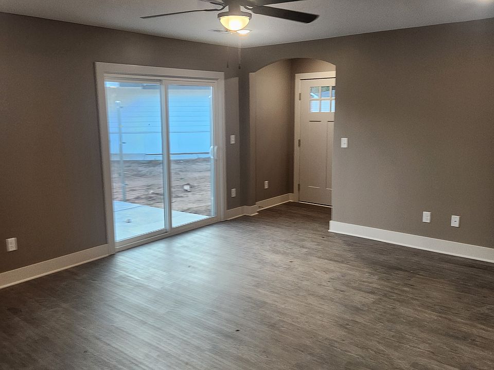 Living room with patio door to patio.