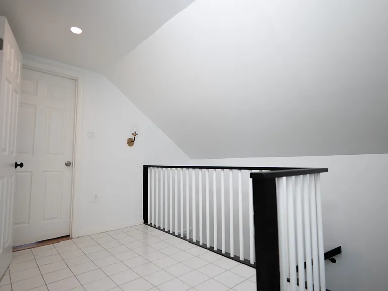 Second floor with small loft space that can fit desk, treadmill or Peleton.