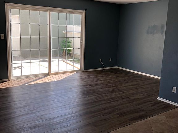 Living room, backdoor leads to patio.