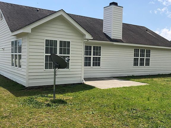 Rear of house showing patio on the back