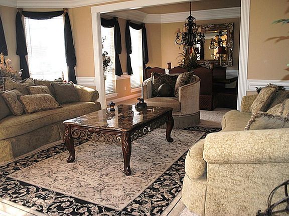 Your guests will be immediately drawn into the formal living room, which is open to the entry. Comfo