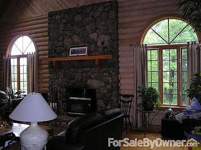 fieldstone fireplace
						:
						room has a 23' cathedral ceiling